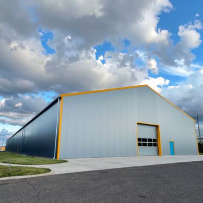 Q345 Prefab Commercial Industrial Steel Construction Warehouse Building With Sliding Door
