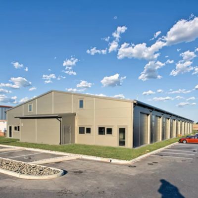 Q345 Prefab Commercial Industrial Steel Construction Warehouse Building With Sliding Door